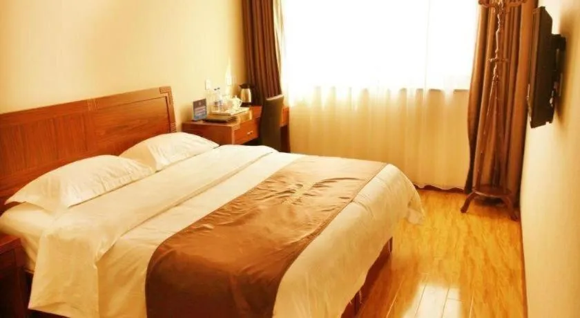 Bed in Beijing Wanjia Traders Hotel