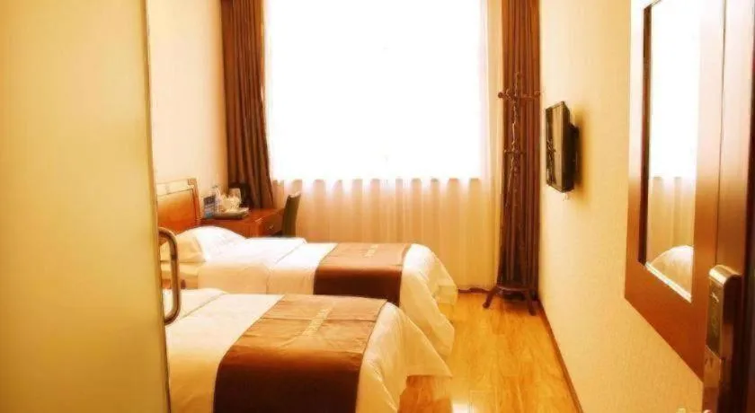 Bed in Beijing Wanjia Traders Hotel