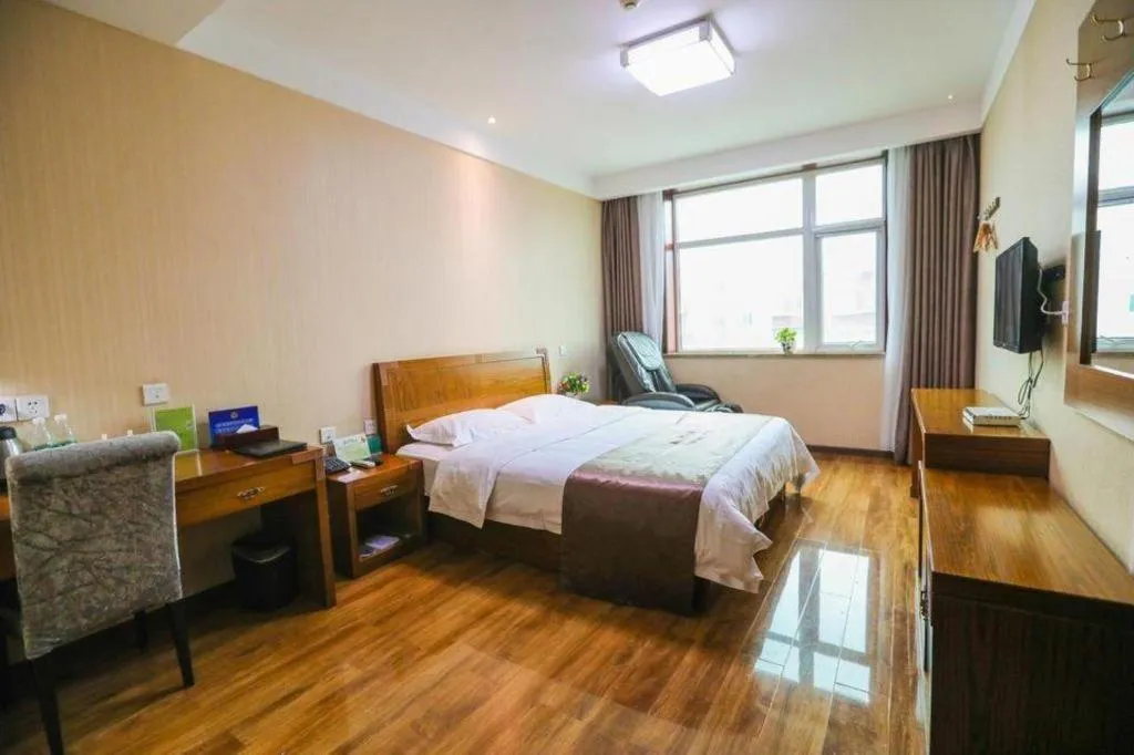 Bed in Beijing Wanjia Traders Hotel