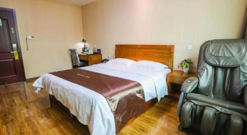 Bed in Beijing Wanjia Traders Hotel