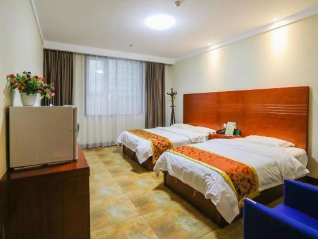 Bed in Beijing Wanjia Traders Hotel