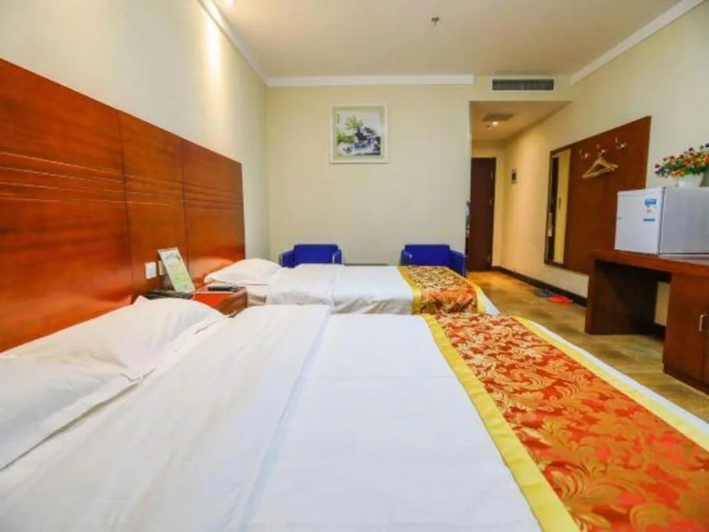 Bed in Beijing Wanjia Traders Hotel