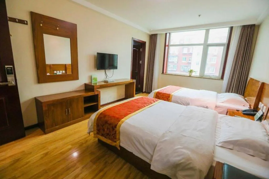 Bed in Beijing Wanjia Traders Hotel