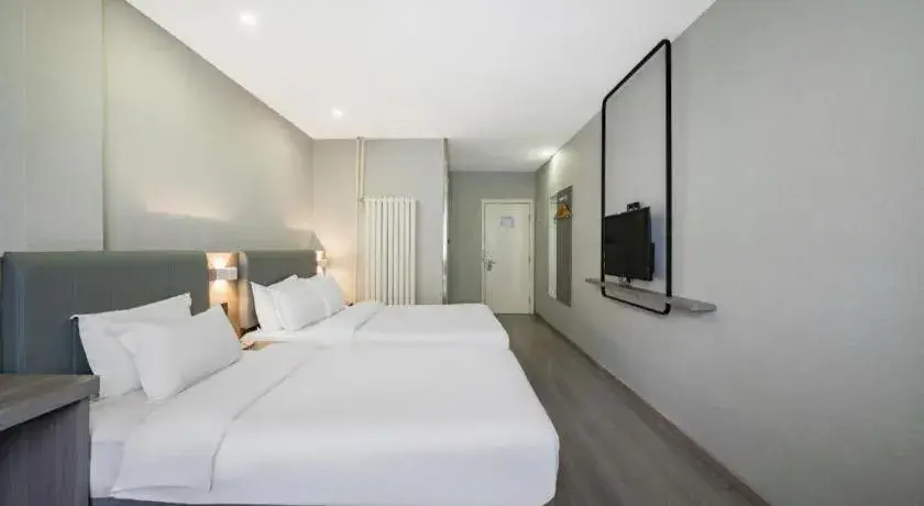 Bed in 7 Days Inn Tianjin Railway Station Bed in 7 Days Inn Tianjin Railway Station