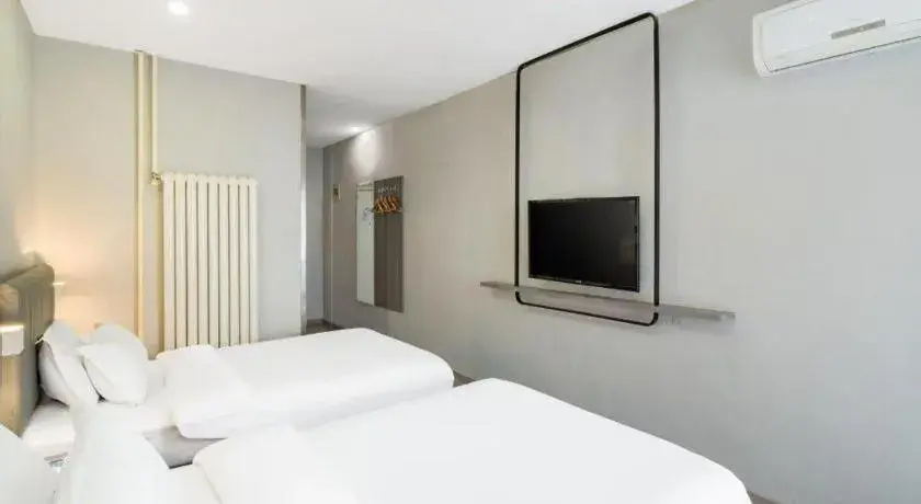 Bed in 7 Days Inn Tianjin Railway Station Bed in 7 Days Inn Tianjin Railway Station