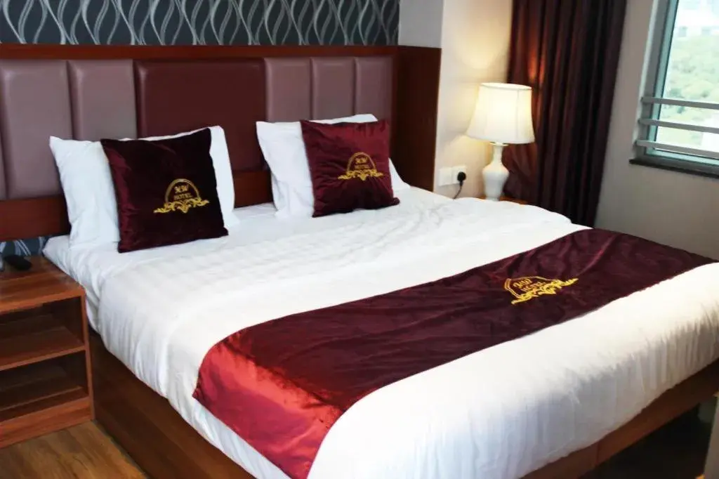 Bed in Metro Winner Hotel Bed in Metro Winner Hotel