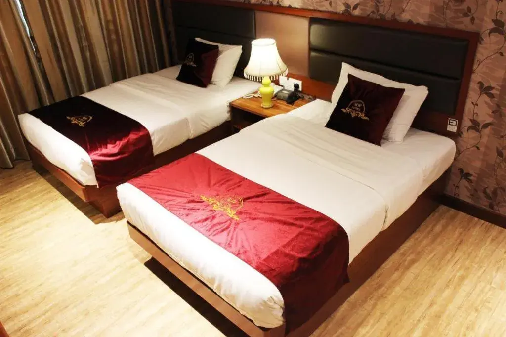 Bed in Metro Winner Hotel Bed in Metro Winner Hotel