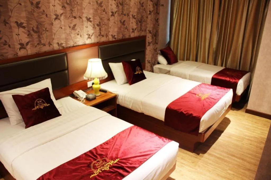 Bed in Metro Winner Hotel