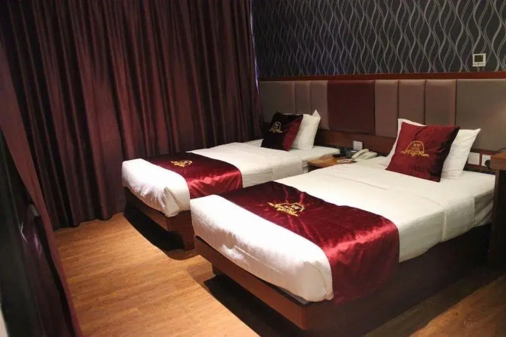 Bed in Metro Winner Hotel Bed in Metro Winner Hotel