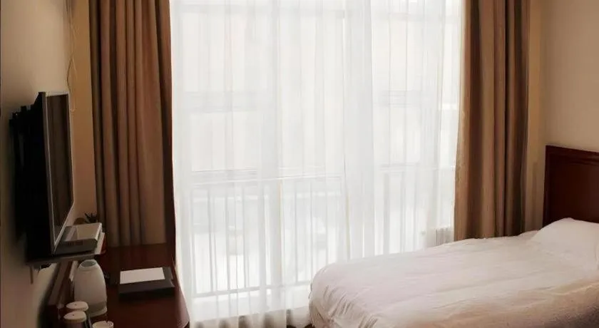 Bed in GreenTree Inn Anhui Fuyang Funan East Huaihe Road Express Hotel