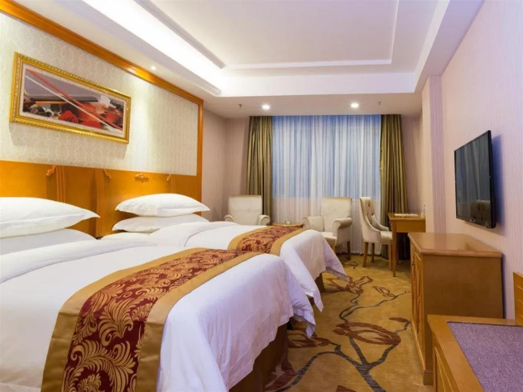 Bed in Vienna Hotel Guangzhou Luochongwei Bus Station Branch