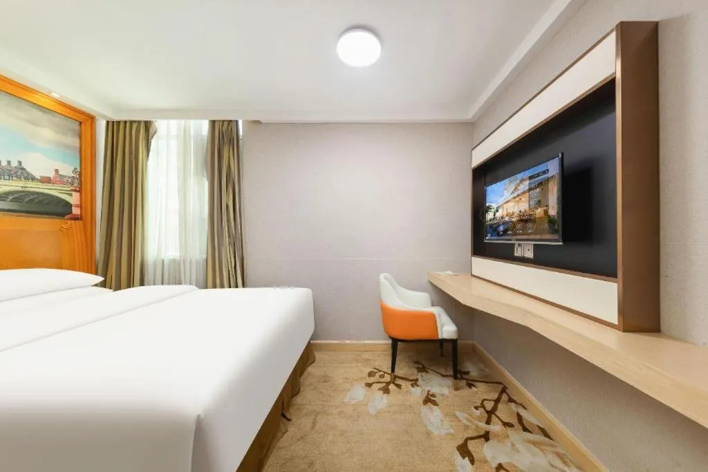 Bed in Vienna Hotel Guangzhou Luochongwei Bus Station Branch