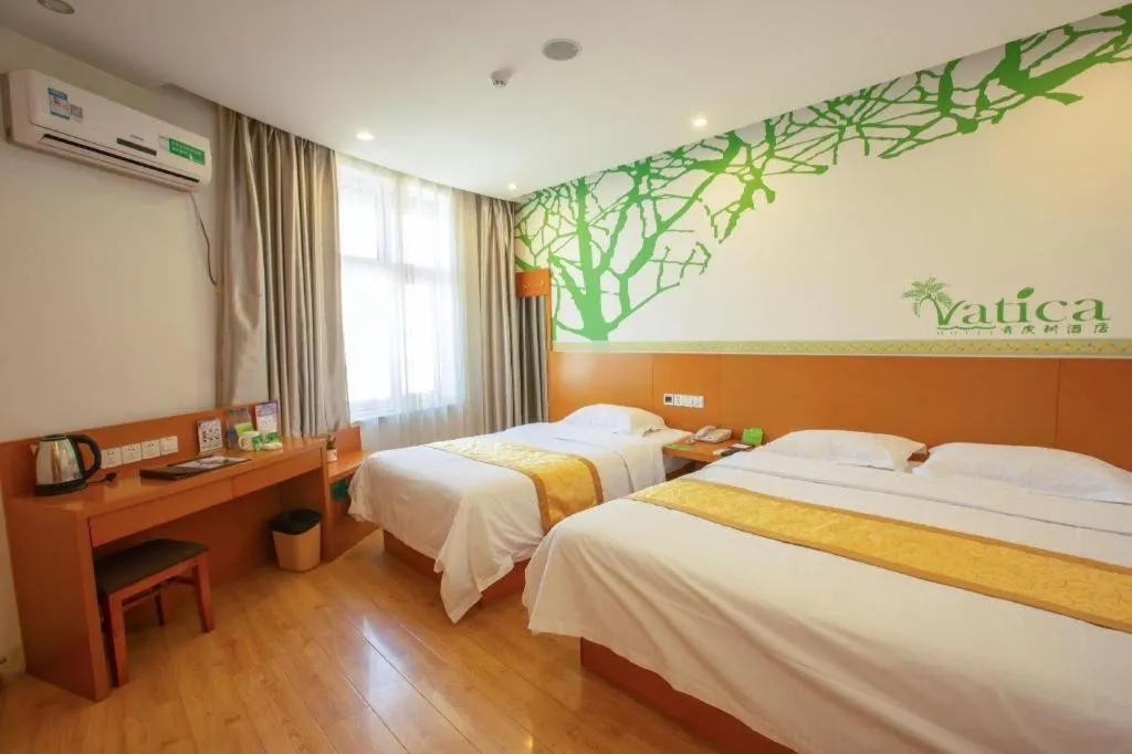 Bed in Vatica Tianjin Jinghai Bus Station Home World Plaza Hotel