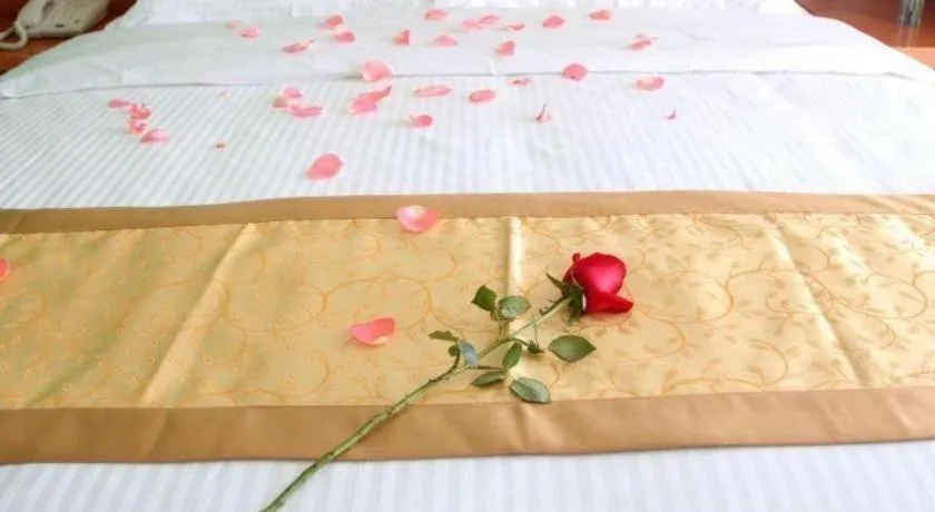 Bed in Vatica Tianjin Jinghai Bus Station Home World Plaza Hotel