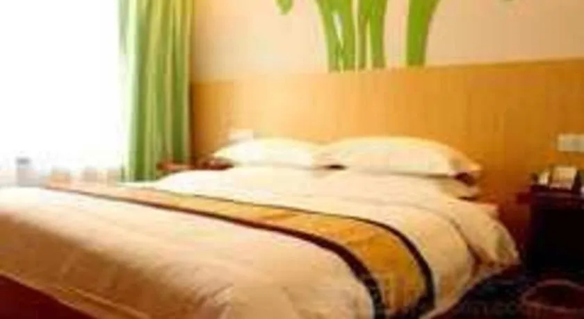 Bed in Vatica Tianjin Jinghai Bus Station Home World Plaza Hotel