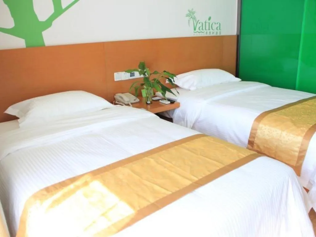 Bed in Vatica Tianjin Jinghai Bus Station Home World Plaza Hotel