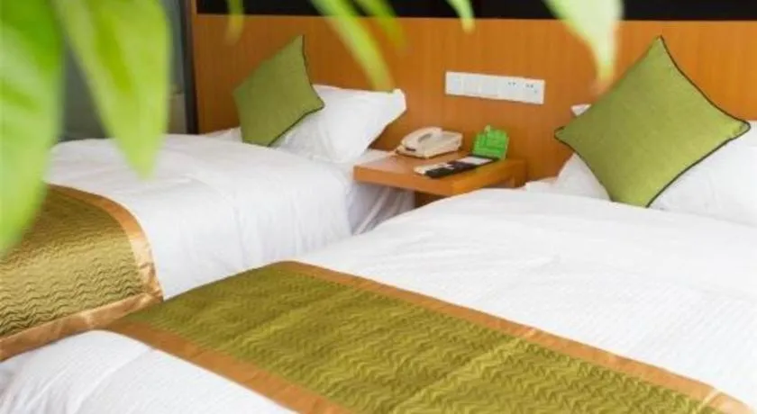 Bed in Vatica Tianjin Jinghai Bus Station Home World Plaza Hotel