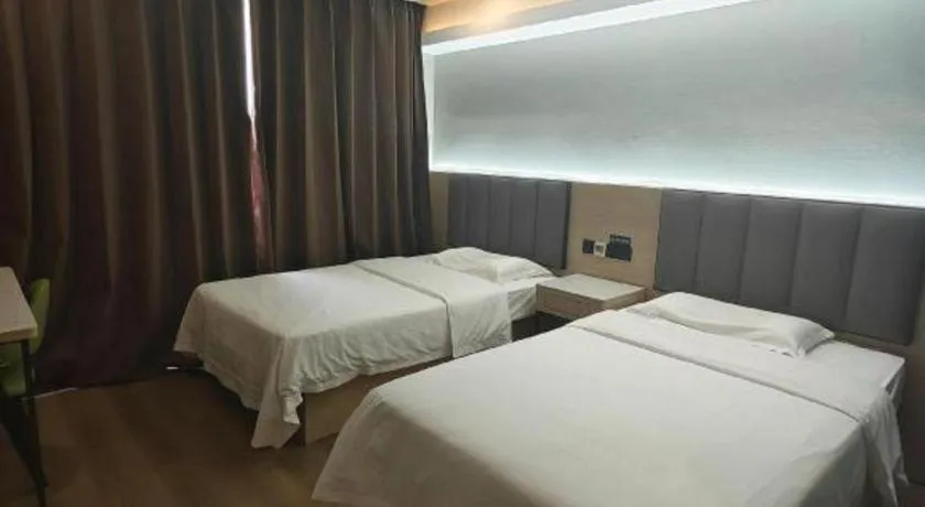 Bed in Vatica Tianjin Jinghai Bus Station Home World Plaza Hotel