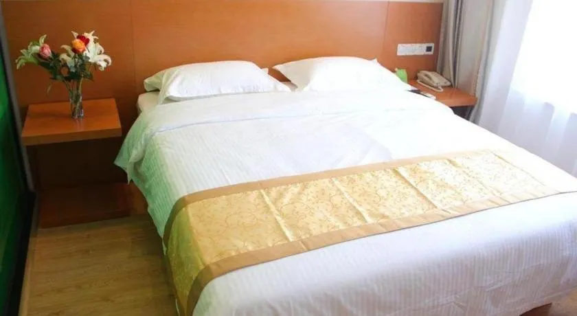 Bed in Vatica Tianjin Jinghai Bus Station Home World Plaza Hotel