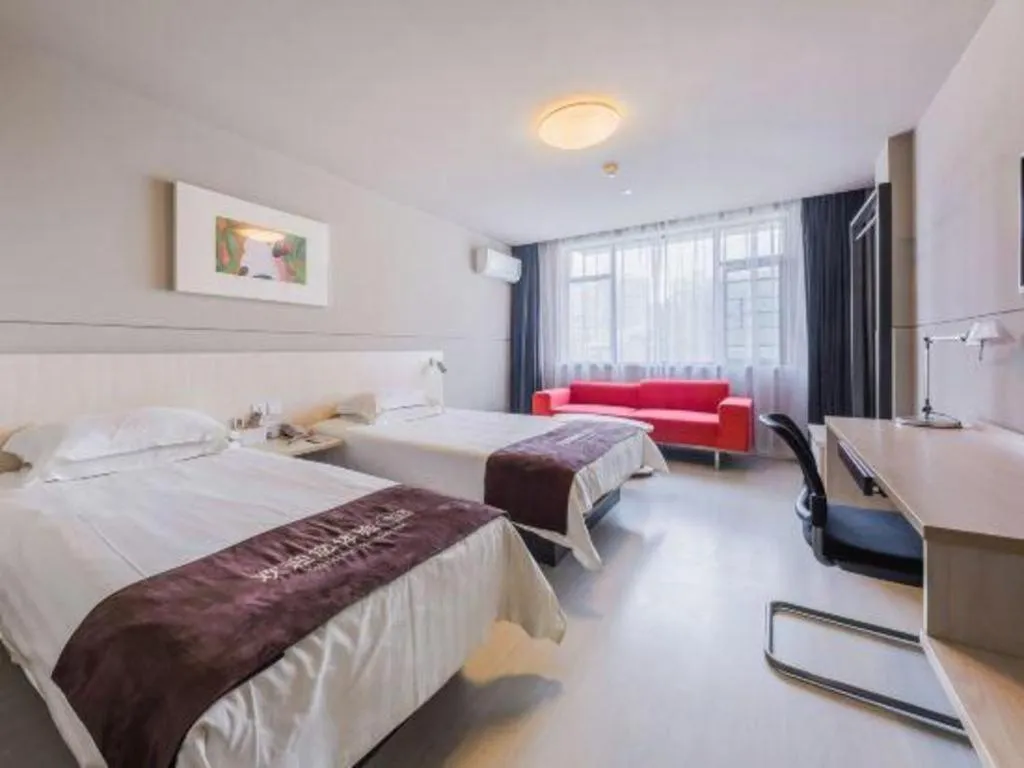 Bed in Jinjiang Inn Jiujiang Internation Exhibition Center