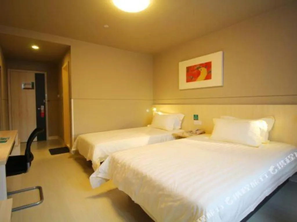 Bed in Jinjiang Inn Jiujiang Internation Exhibition Center