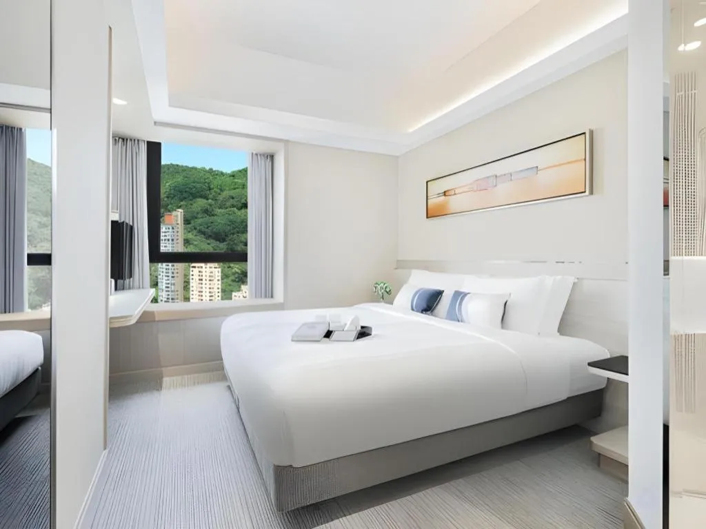 Bed in Elysion Place Hotel Causeway Bay