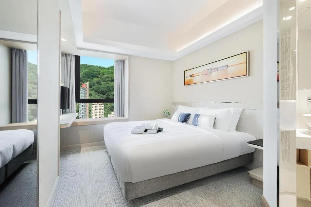 Bed in Elysion Place Hotel Causeway Bay
