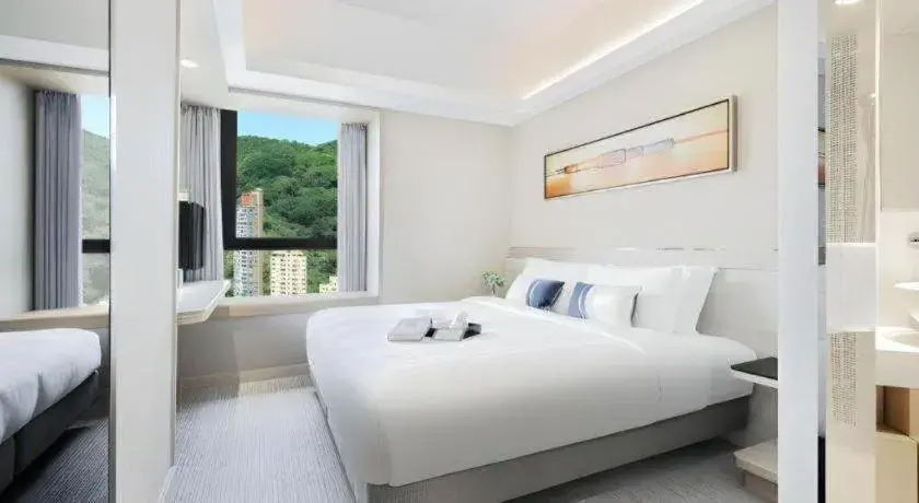 Bed in Elysion Place Hotel Causeway Bay Bed in Elysion Place Hotel Causeway Bay