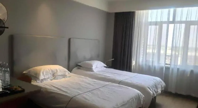 Bed in Jinjiang Inn Baotou Salaqi Railway Station