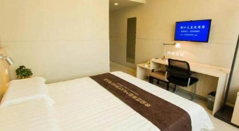 Bed in Jinjiang Inn Hohhot Dazhao Hospital Metro Station