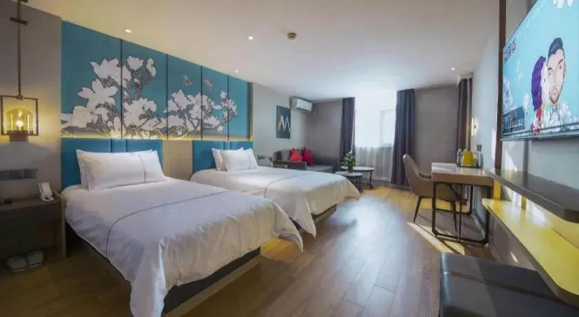 Bed in Magnotel Business Xuzhou Feng County Bus Station Bed in Magnotel Business Xuzhou Feng County Bus Station