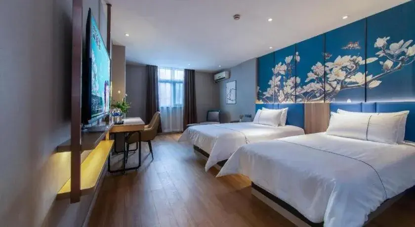 Bed in Magnotel Business Xuzhou Feng County Bus Station Bed in Magnotel Business Xuzhou Feng County Bus Station