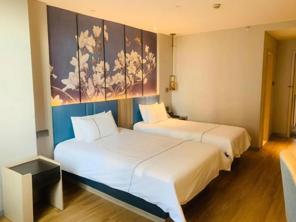 Bed in Magnotel Business Xuzhou Feng County Bus Station