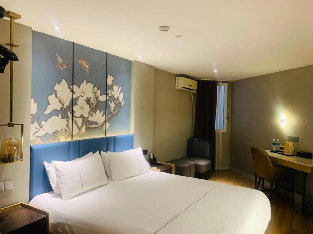 Bed in Magnotel Business Xuzhou Feng County Bus Station