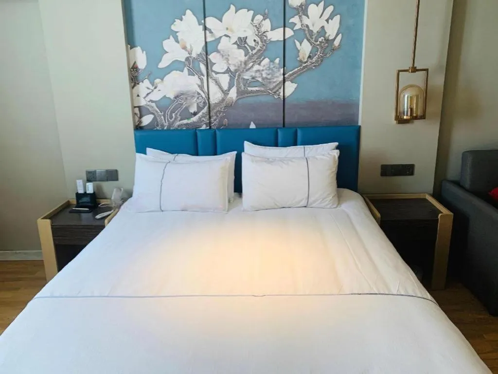 Bed in Magnotel Business Xuzhou Feng County Bus Station