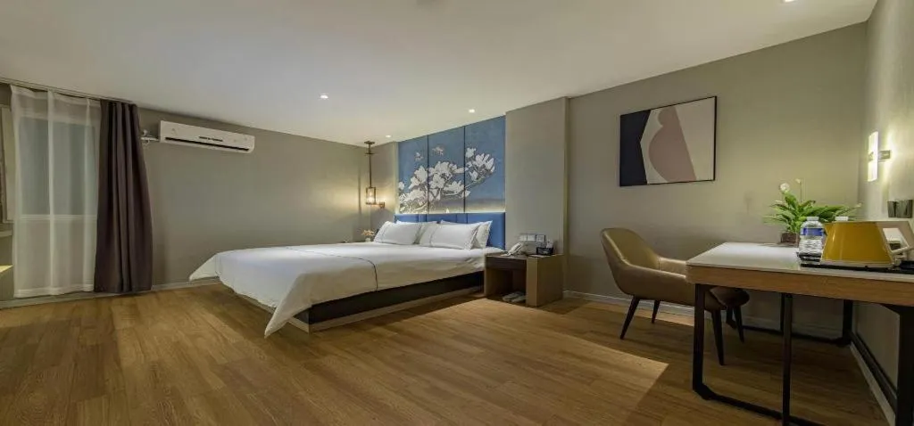 Bed in Magnotel Business Xuzhou Feng County Bus Station