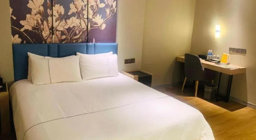 Bed in Magnotel Business Xuzhou Feng County Bus Station