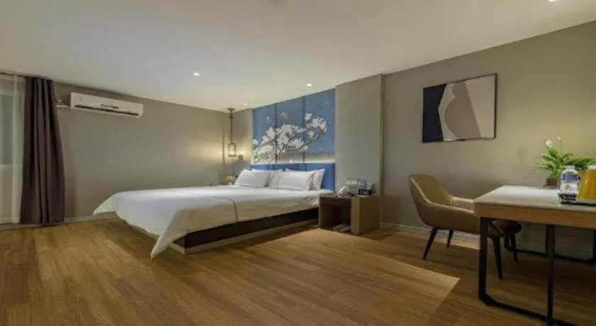 Bed in Magnotel Business Xuzhou Feng County Bus Station