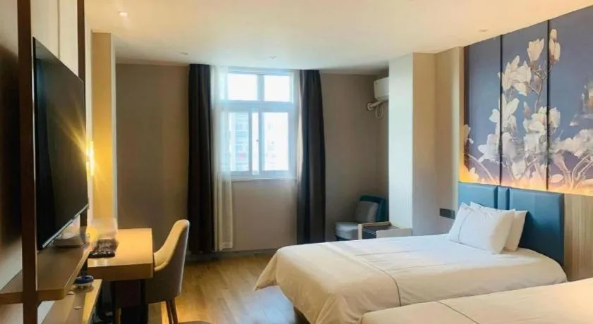 Bed in Magnotel Business Xuzhou Feng County Bus Station