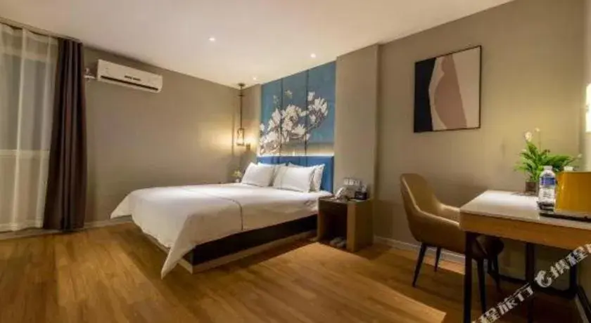 Bed in Magnotel Business Xuzhou Feng County Bus Station Bed in Magnotel Business Xuzhou Feng County Bus Station