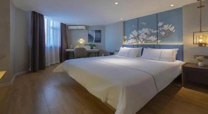 Bed in Magnotel Business Xuzhou Feng County Bus Station Bed in Magnotel Business Xuzhou Feng County Bus Station