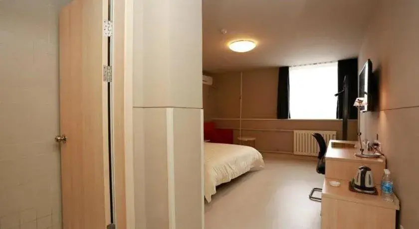 Bed in Jinjiang Inn Hotel Tianjin Xinkai Road Branch Bed in Jinjiang Inn Hotel Tianjin Xinkai Road Branch