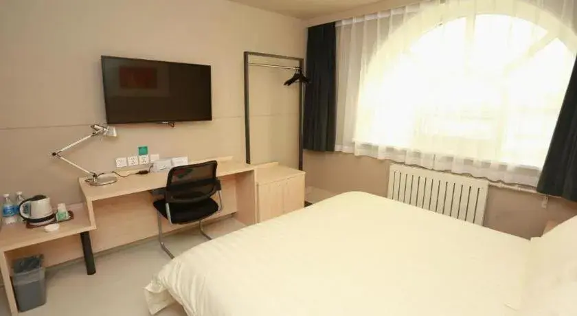 Bed in Jinjiang Inn Hotel Tianjin Xinkai Road Branch Bed in Jinjiang Inn Hotel Tianjin Xinkai Road Branch