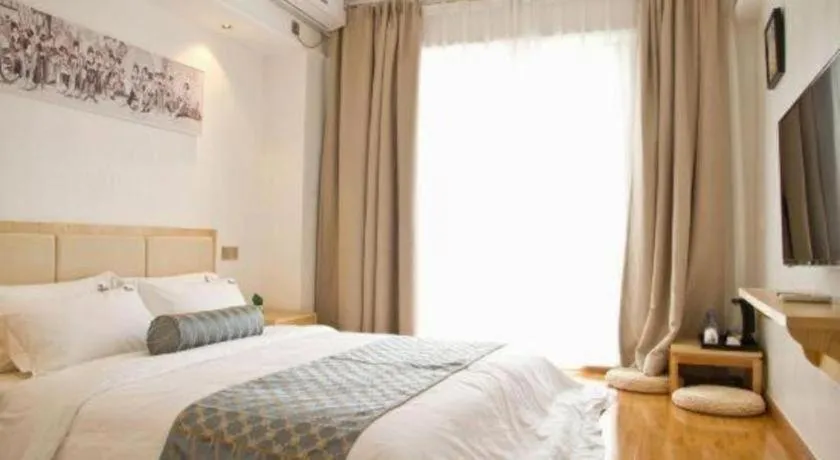 Bed in Guangzhou Impression Hotel