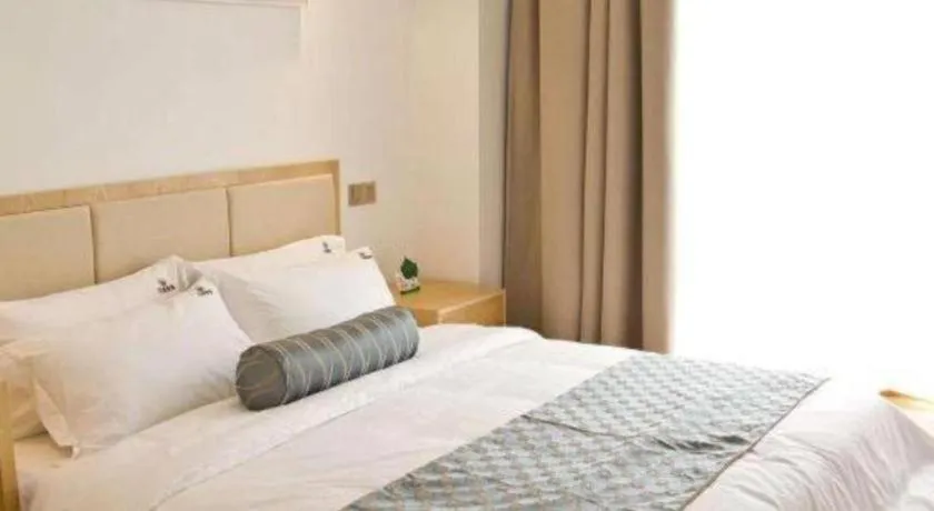 Bed in Guangzhou Impression Hotel