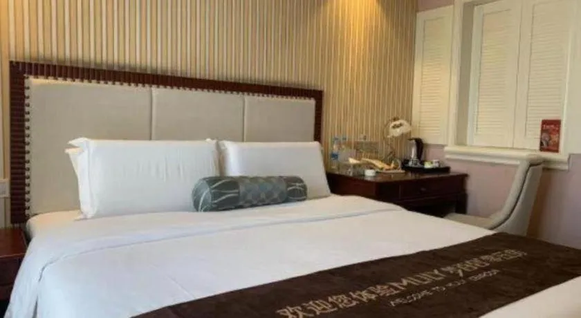 Bed in Guangzhou Impression Hotel
