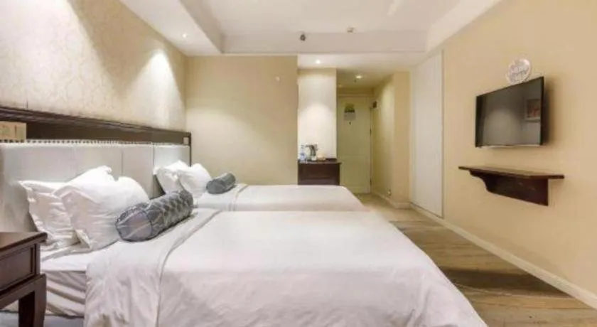 Bed in Guangzhou Impression Hotel