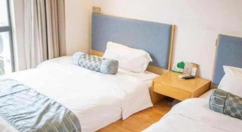 Bed in Guangzhou Impression Hotel