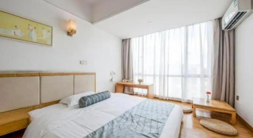 Bed in Guangzhou Impression Hotel