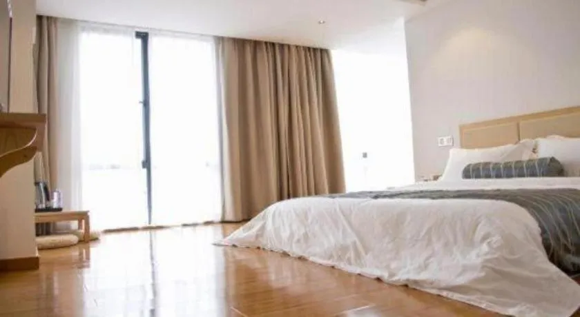 Bed in Guangzhou Impression Hotel